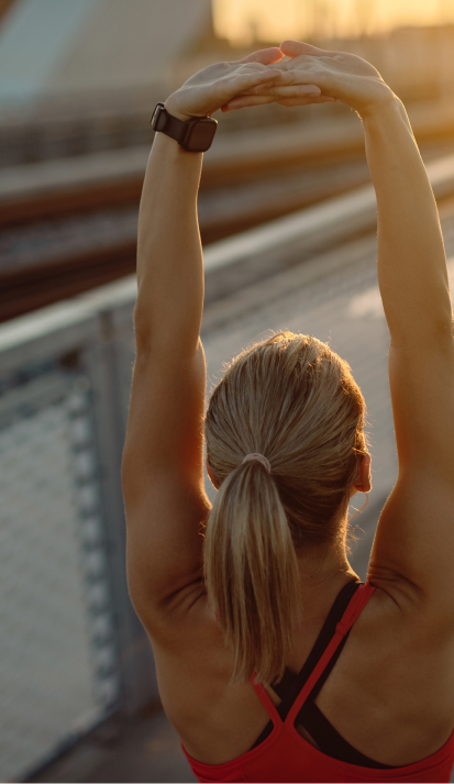 woman stretching to prevent lower back pain